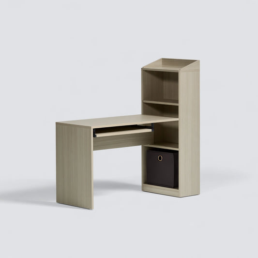 Light gray wood-textured Vyrnloft office desk shown from an angled view, suitable for home or workspace environments.