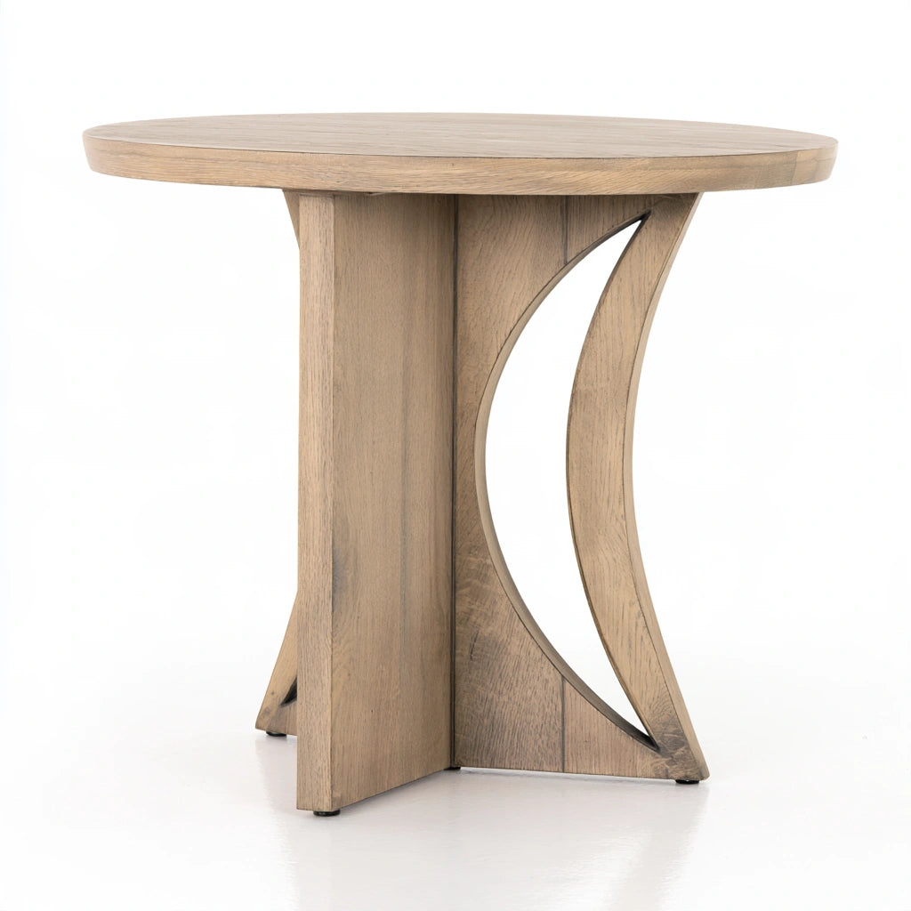 Vyrnloft light oak round accent table with a natural wood finish, ideal for living room decor and small space use
