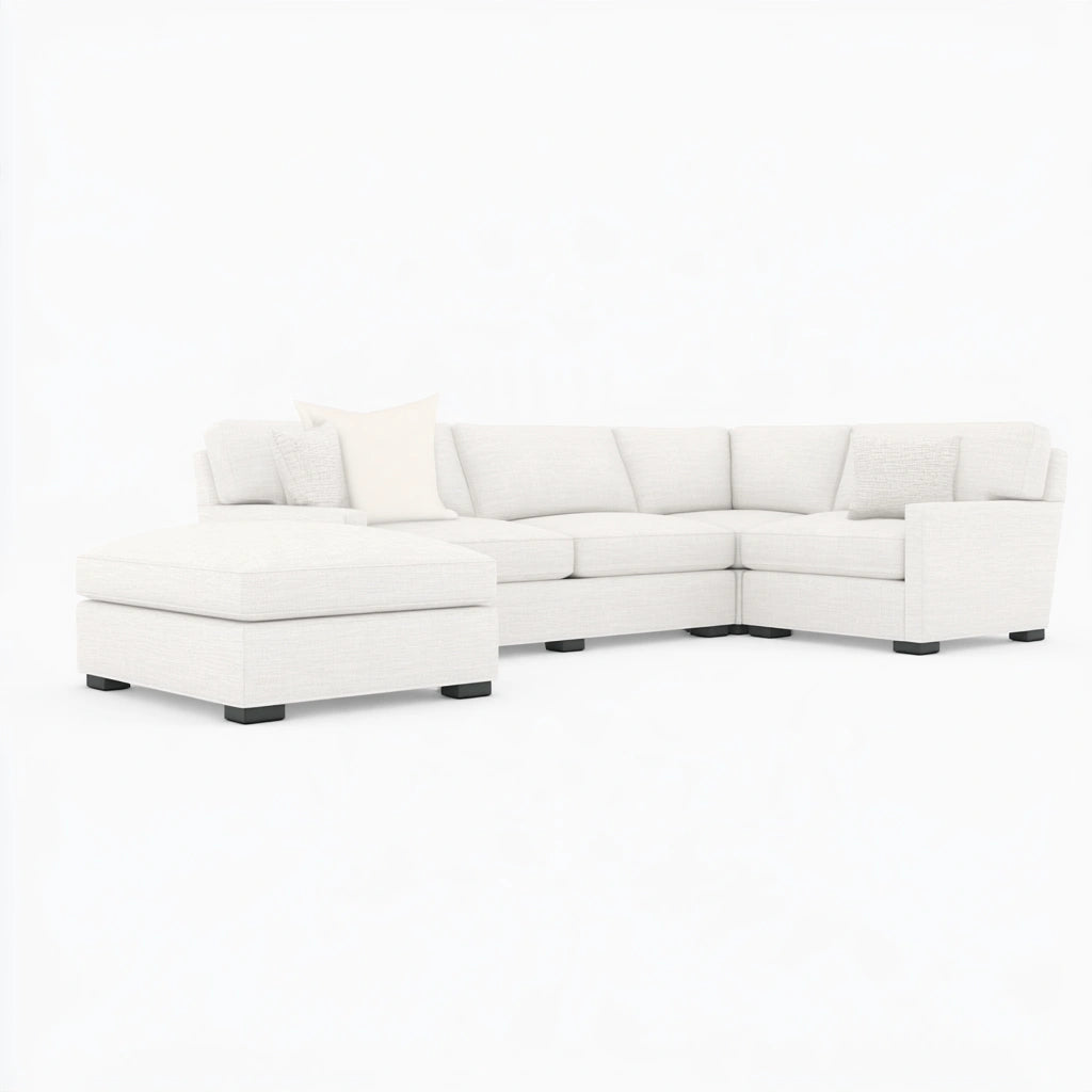 Modern beige Vyrnloft modular sectional sofa viewed from an angle, showcasing its contemporary design and comfortable seating.