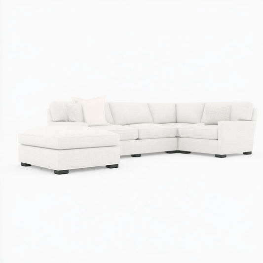 Modern beige Vyrnloft modular sectional sofa viewed from an angle, showcasing its contemporary design and comfortable seating.