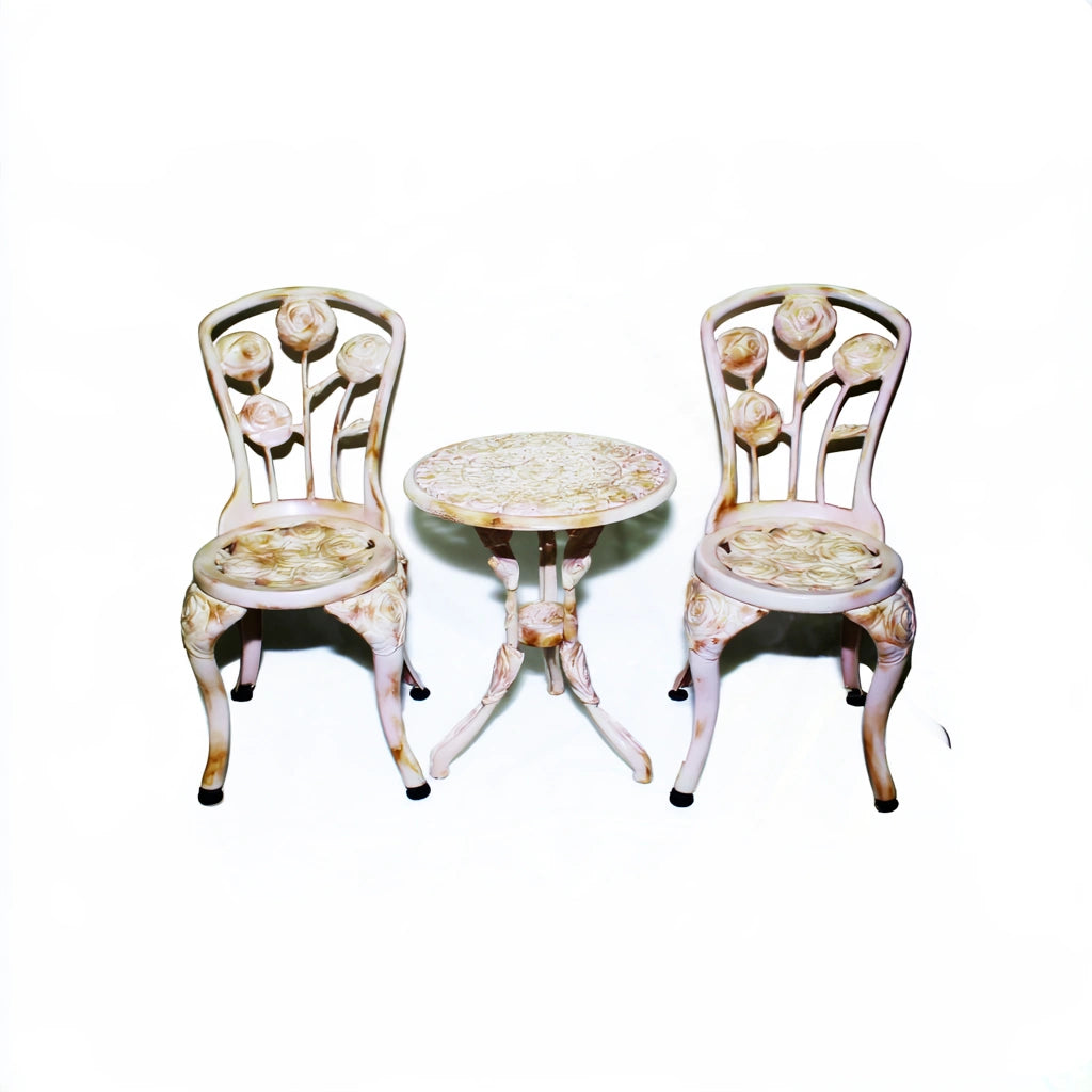 Vyrnloft white cast aluminum garden bistro set with table and chairs, perfect for outdoor patio or garden seating.